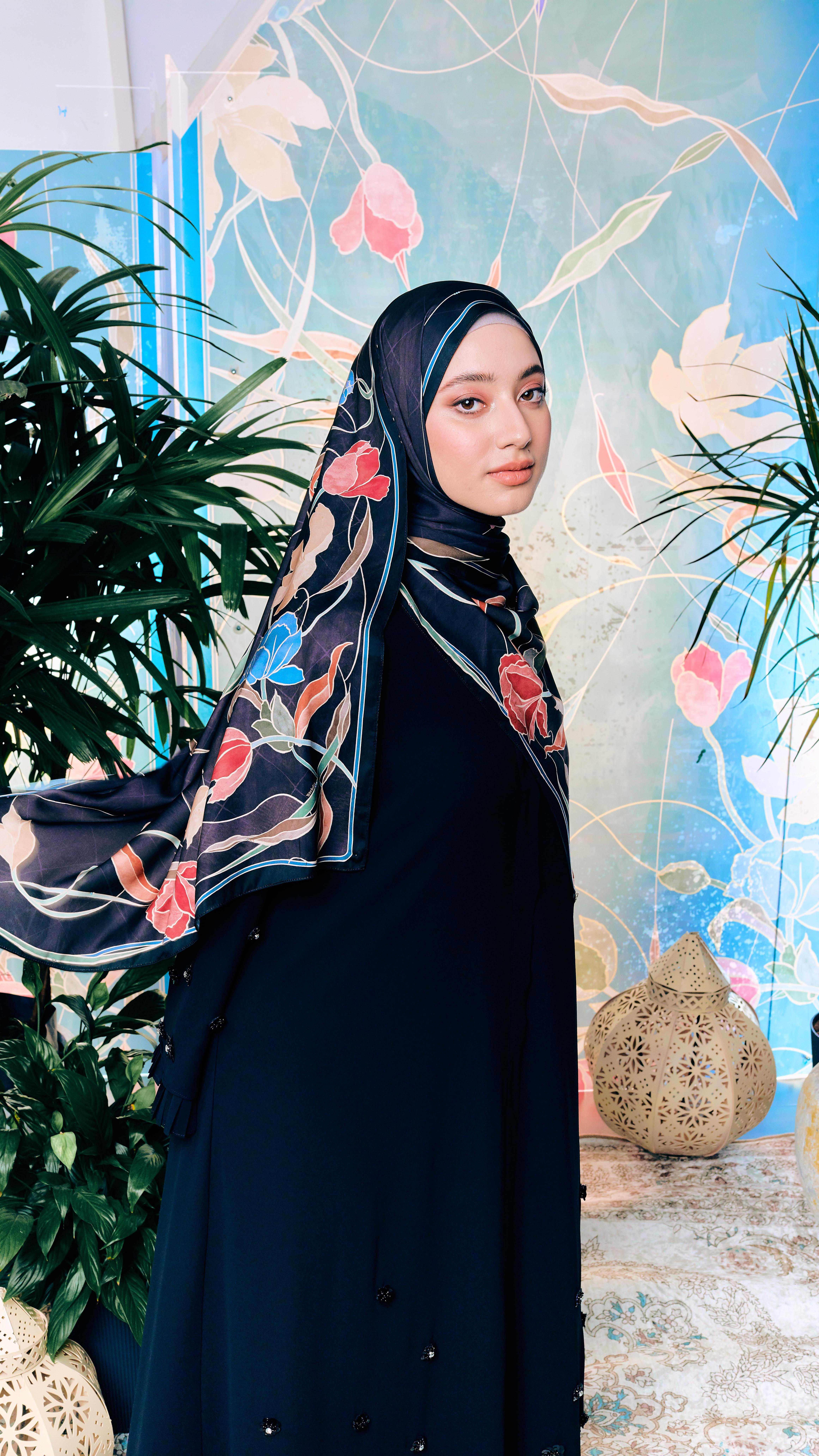 Choices, choices! Kuntum Square or Cahaya Kristal Shawl, can you pick just one, or are you falling for both? Share your choice below! <br/>
<br/>
#GenerasiNaelofar #NaelofarRaya #rayacollection